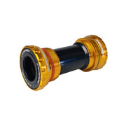 Gold Shimano HT2 ceramic bottom bracket with uberbike branding on a white background