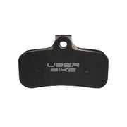 Uberbike brake pad insertwith 'UberBike' branding on a white background