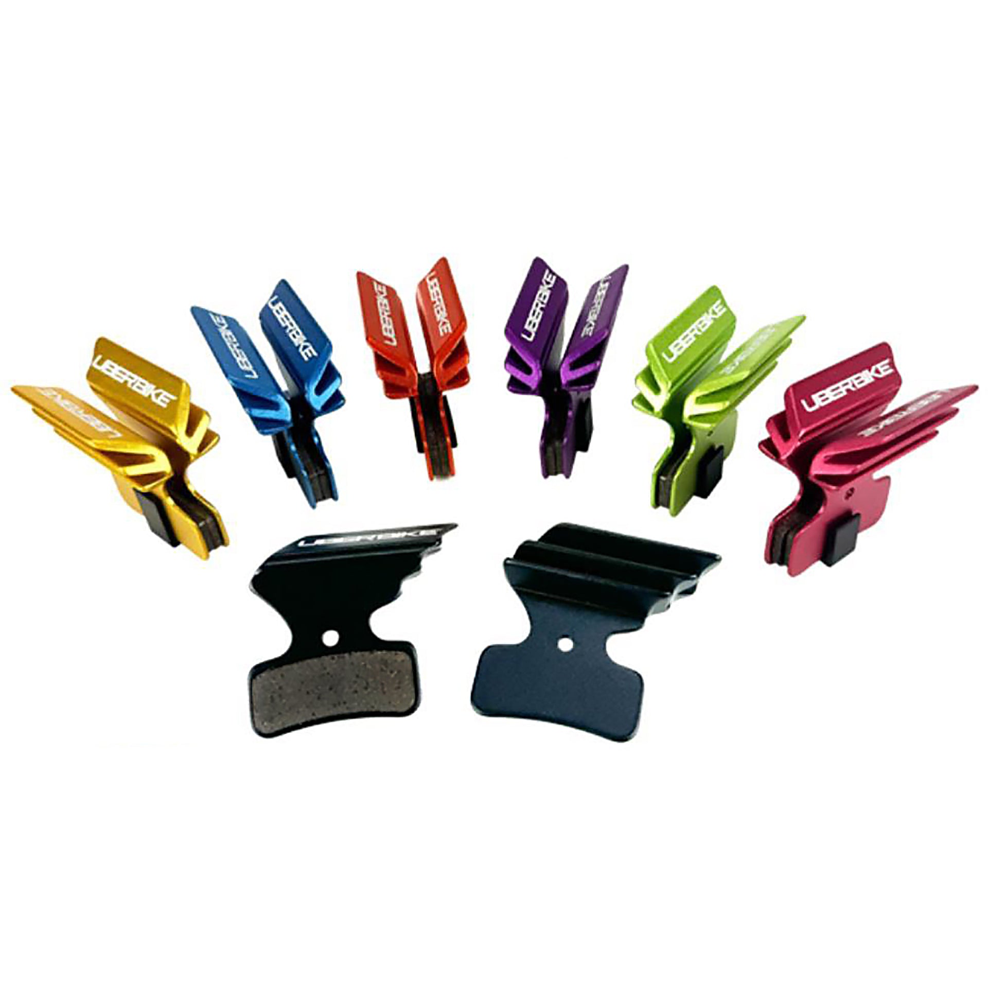 Assorted coloured finned disc brake pads for Shimano M7120 Polar tech brake pads on a white background