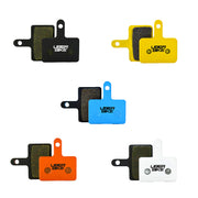 5 different coloured brake pads for Shimano MT200 with Uberbike branding on a white background
