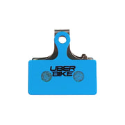 Shimano SLX M666 brake pad insert with Uberbike branding on a white background