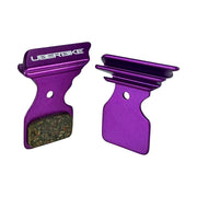 purple finned Shimano Tiagra BR4770 disc brake pads on a white background