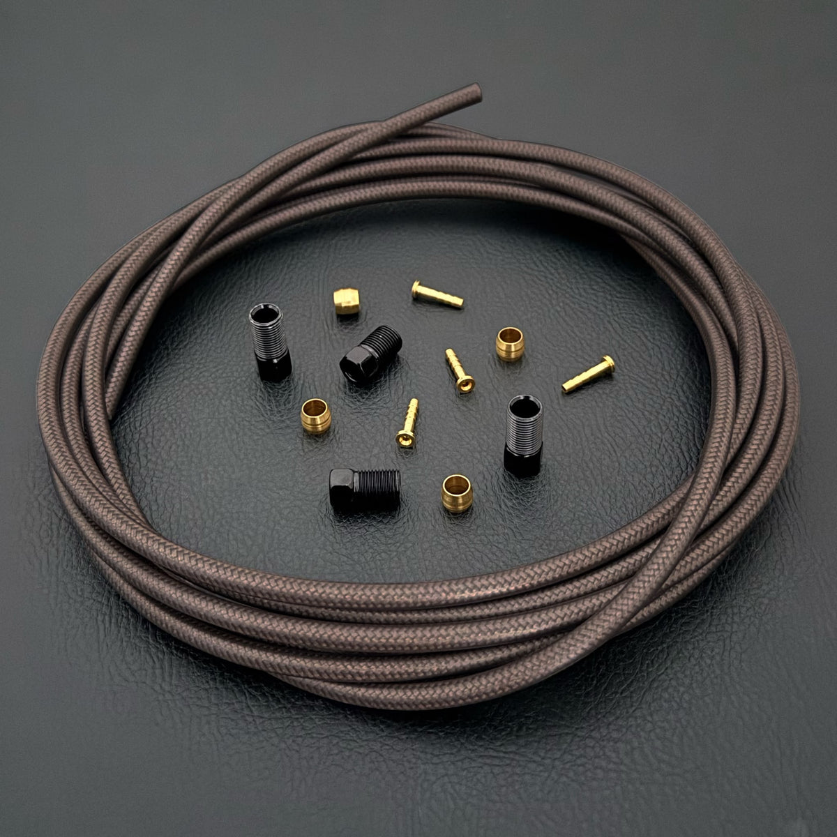 Shimano xtr hydraulic smoke braid stainless brake hose kit with straight connector fittings and Uberbike branding on a white background