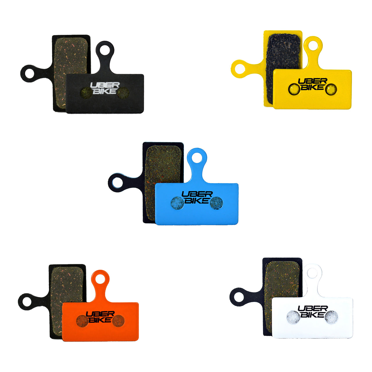 5 different coloured brake pads for Shimano XTR M9020 calipers with Uberbike branding on a white background