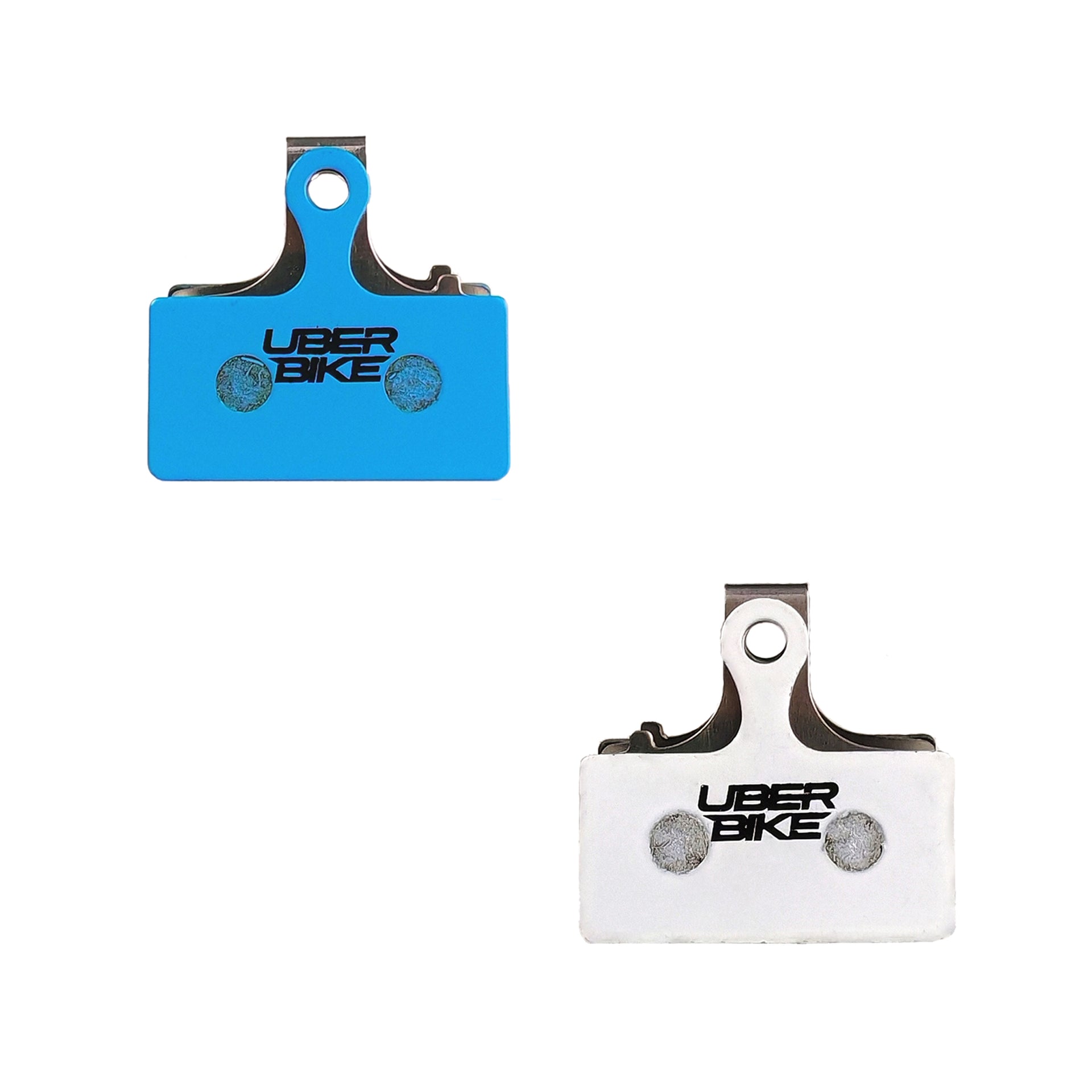 Shimano XTR brake pad inserts with Uberbike branding on a white background
