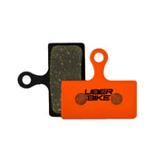 Shimano m6200 kevlar compound Uberbike branded brake pads on a white background 