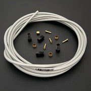 Shimano xtr hydraulic silver braid  kevlar brake hose kit with straight connector fittings and Uberbike branding on a white background