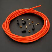 Shimano xtr hydraulic orange kevlar brake hose kit with straight connector fittings and Uberbike branding on a white background