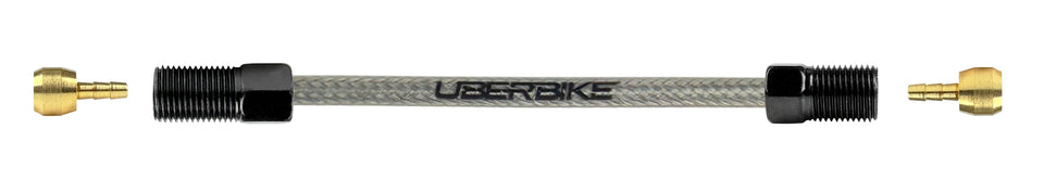An exploded diagram of a stainless hydraulic brake hose kit for Shimano XTR brakes with Uberbike branding and straight connector fittings on a white background