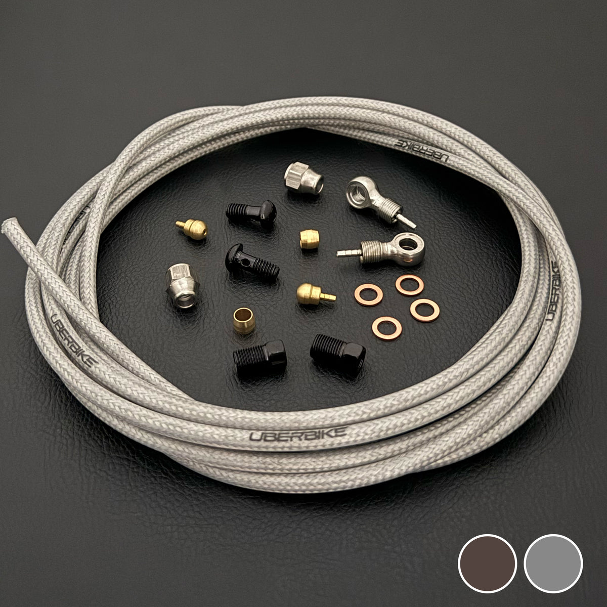 SRAM G2 RSC raw silver stainless hydraulic brake hose kit with straight connector stealthmajig fittings and Uberbike branding on a black background