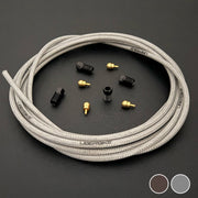 SRAM Motive bronze raw silver stainless hydraulic brake hose kit with straight connector stealthmajig fittings and Uberbike branding on a black background