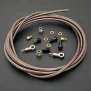 TRP Evo Pro / Evo X hydraulic smoke briad stianless brake hose kit with banjo fittings and Uberbike branding on a black background