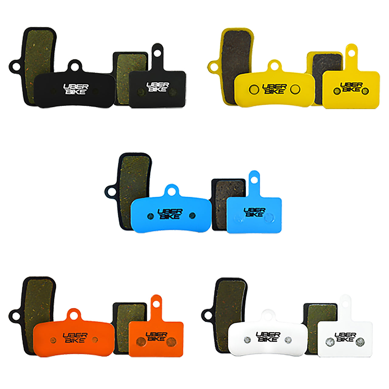 Collection of Uberbike brake pads in various colors on a white background.