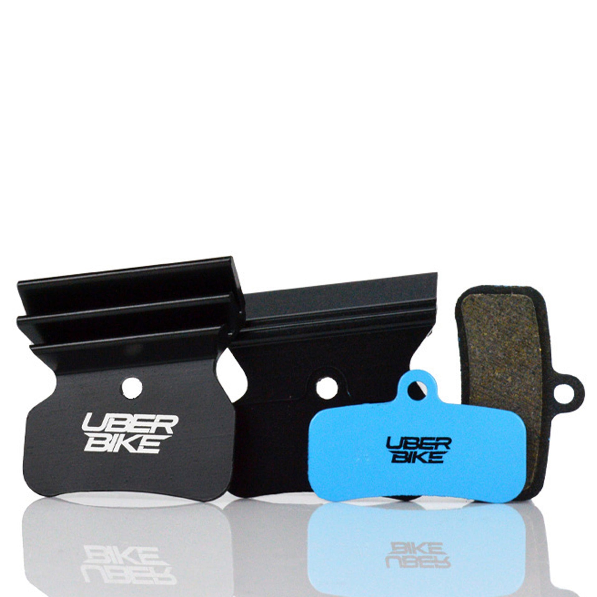 CNC Finned Shimano E-Matrix MTB/ebike brake pads with Uberbike branding on a white background.
