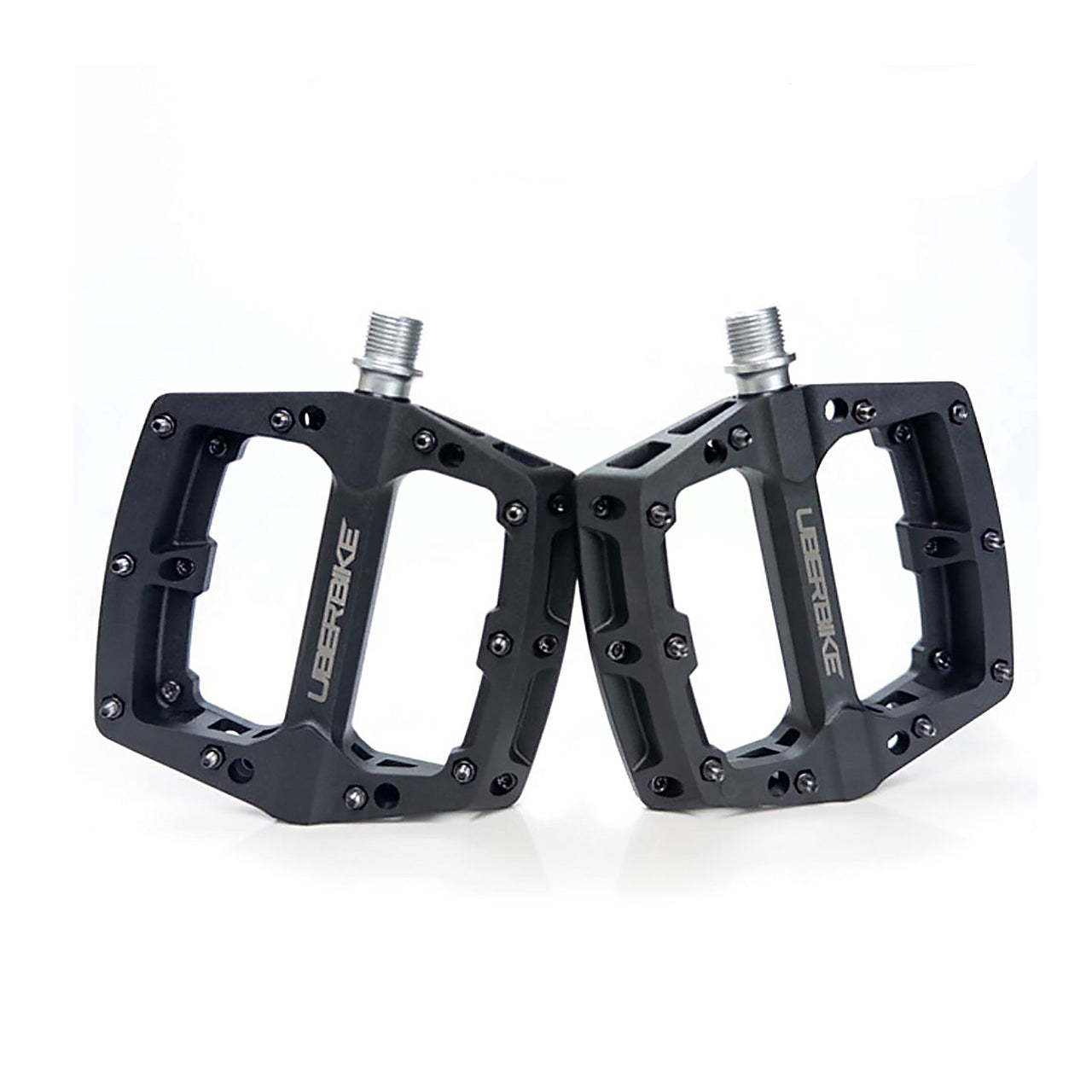 black mtb composite pedal with Uberbike branding on a white background