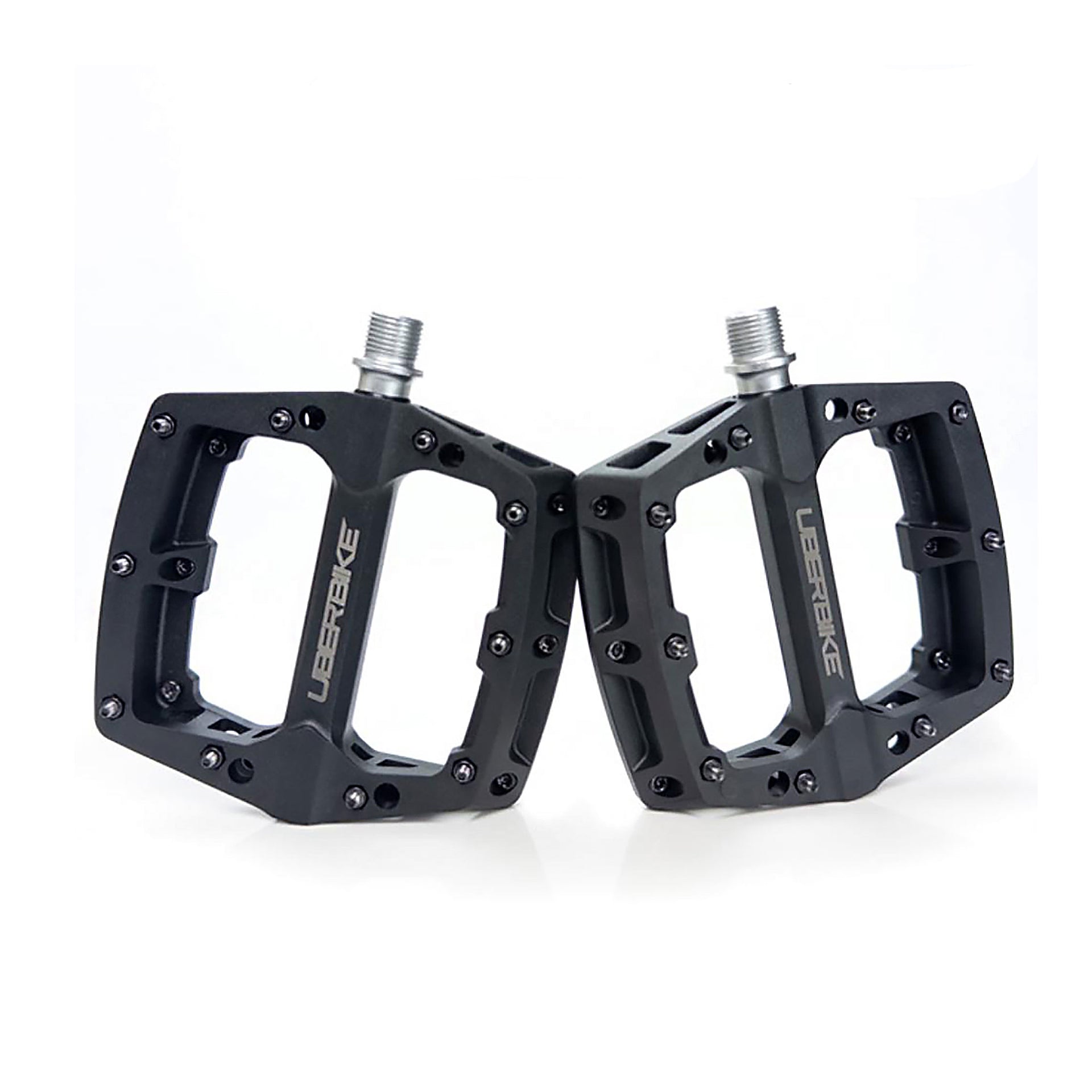 black mtb composite pedal with Uberbike branding on a white background