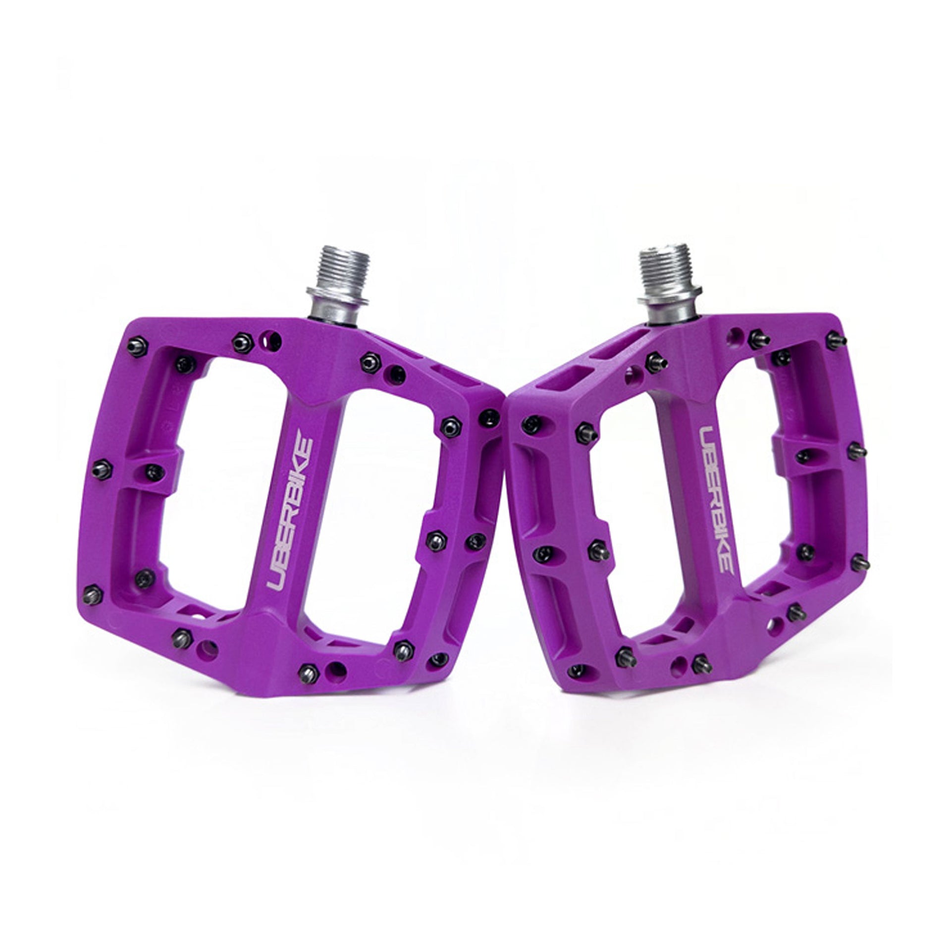 purple mtb composite pedal with Uberbike branding on a white background