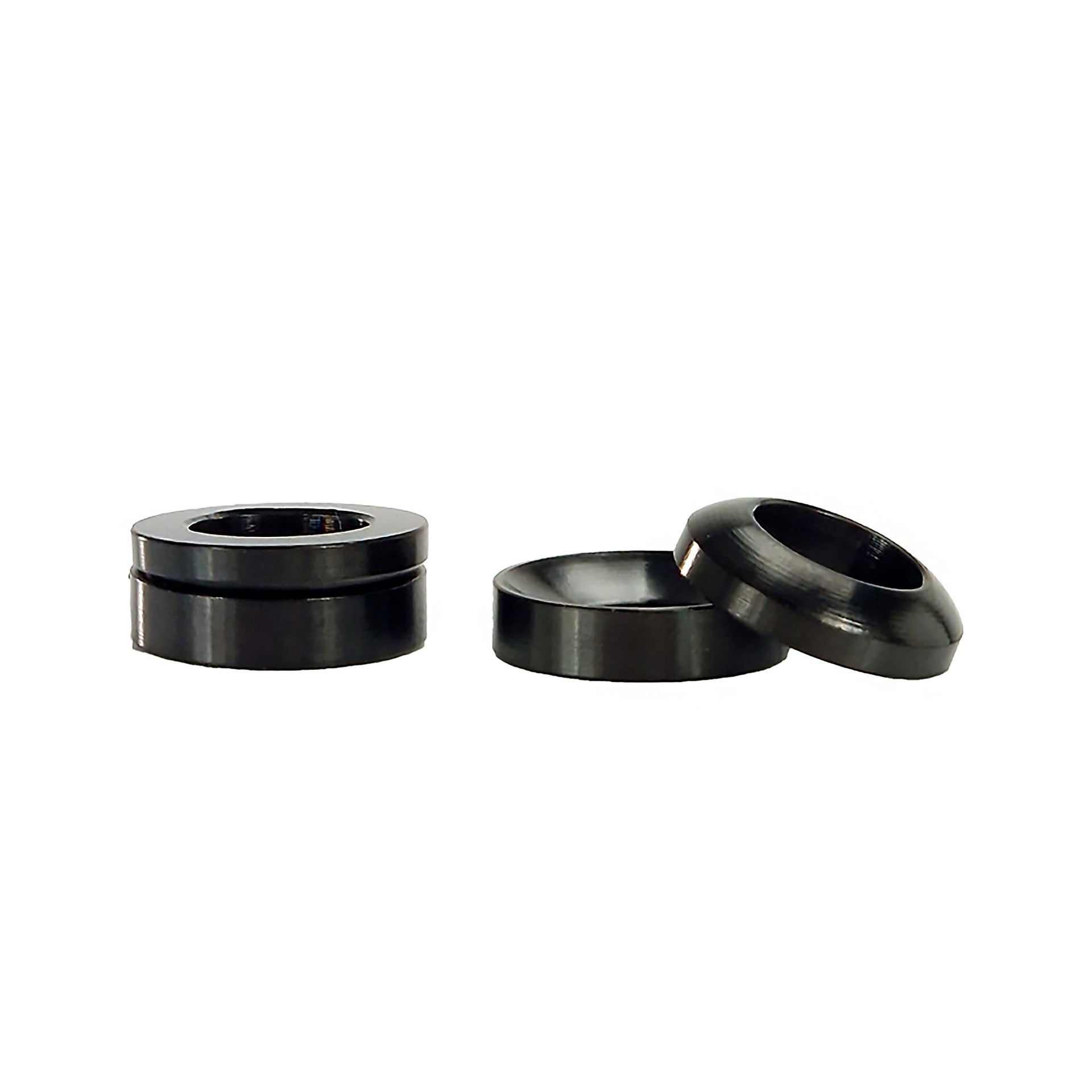 4 black cup and cone washers on white background
