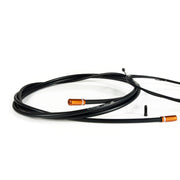 black road gear cable with orange sealed ferrules on a white background