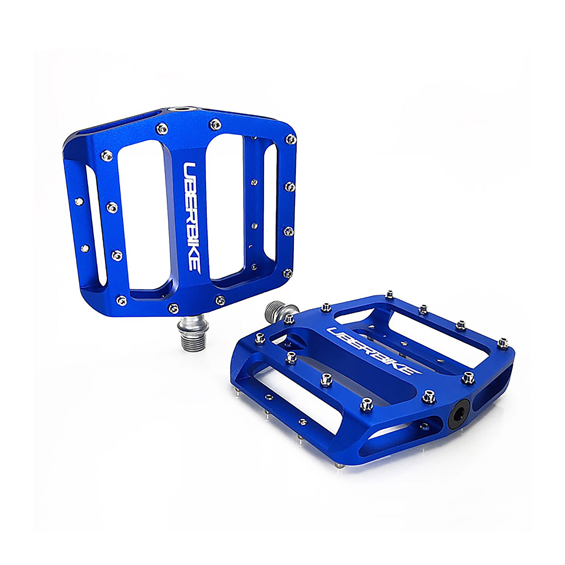 blue flatout mtb pedals with Uberbike branding on a white background