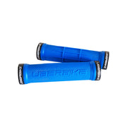 2 blue half waffle mountain bike grips with black lockrings and uberbike branding on a white background