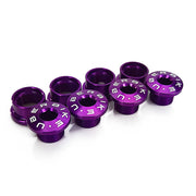 Purple alloy chainring bolts on a white background with Uberbike branding 