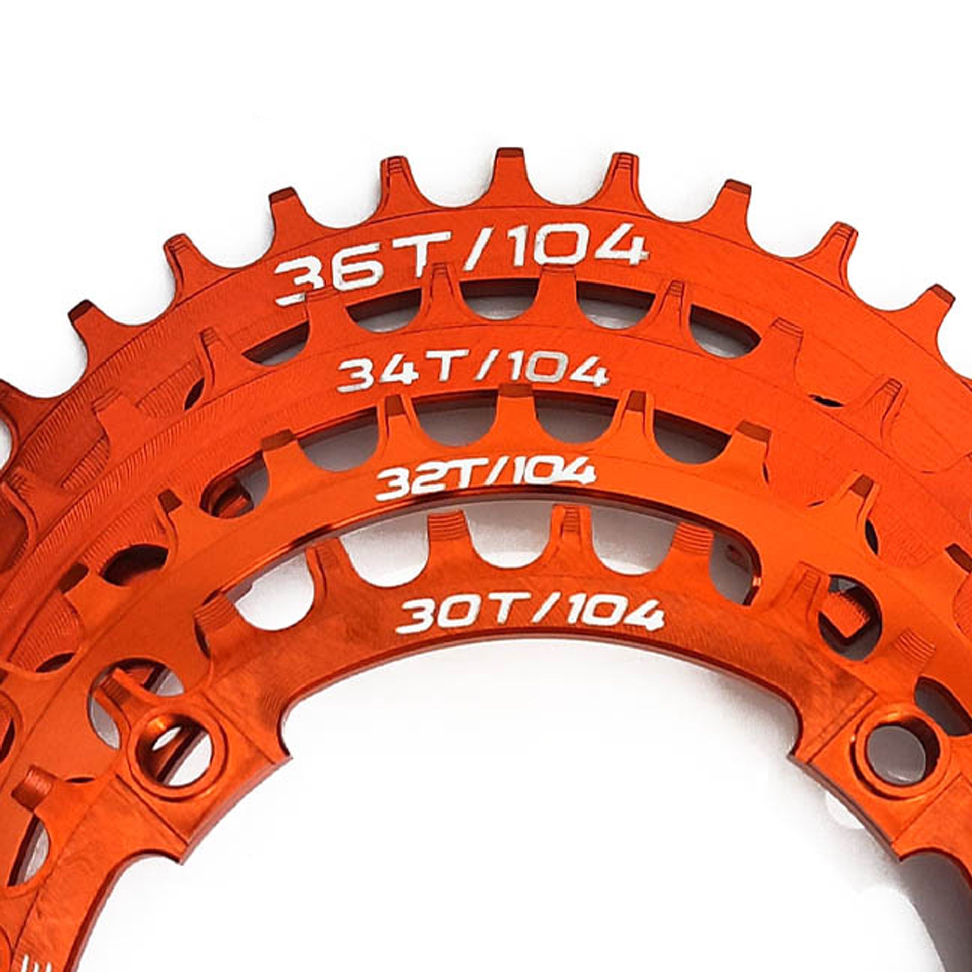 orange bicycle chainring with multiple tooth counts on a white background