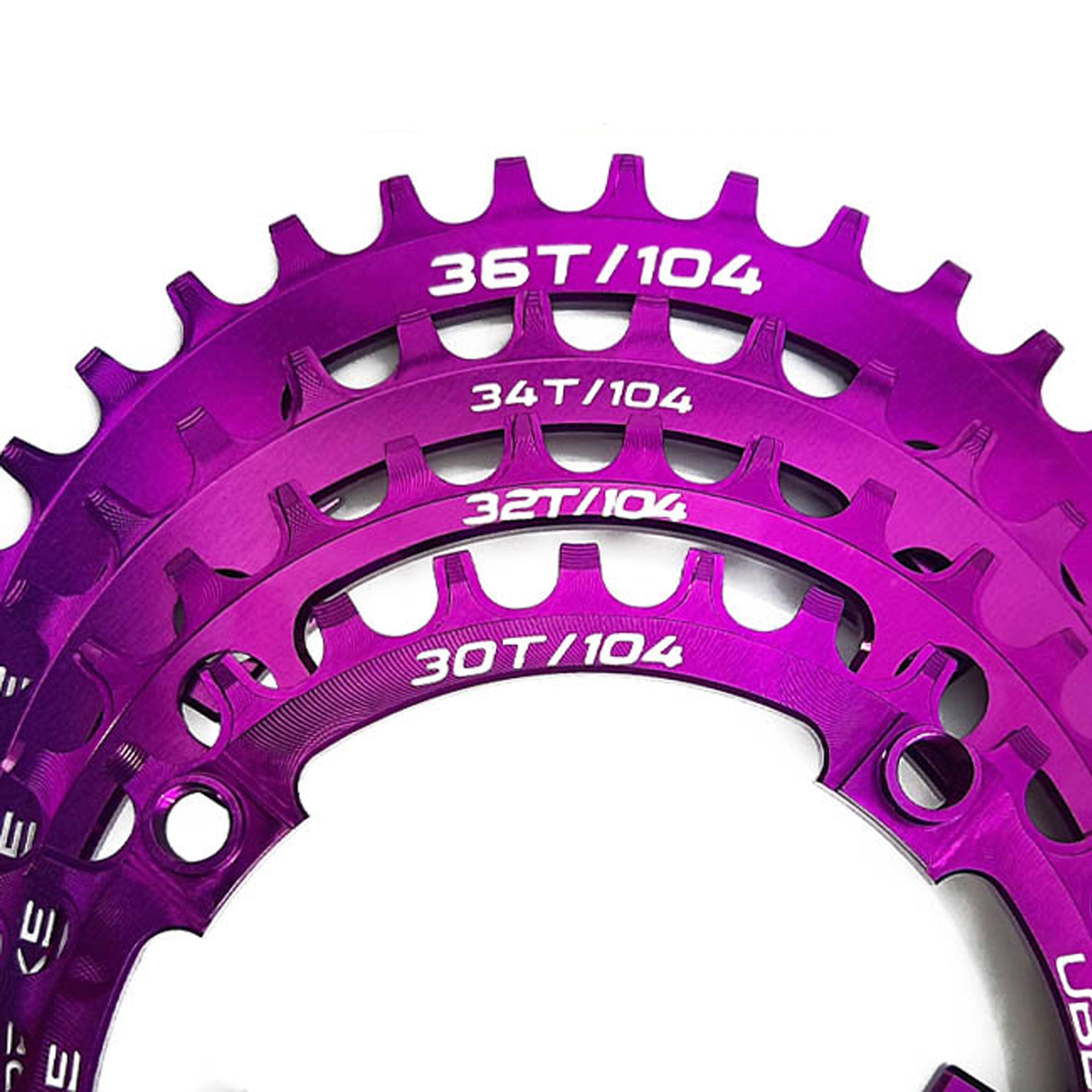 purple bicycle chainring with multiple tooth counts on a white background