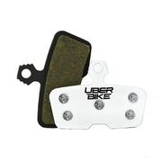 Brake pads with 'UberBike' branding on a white background.