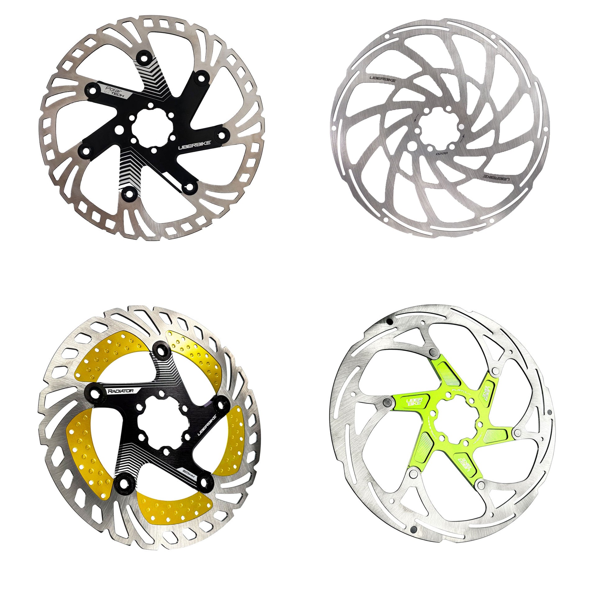 Four disc brake rotors with different designs and colors on a white background