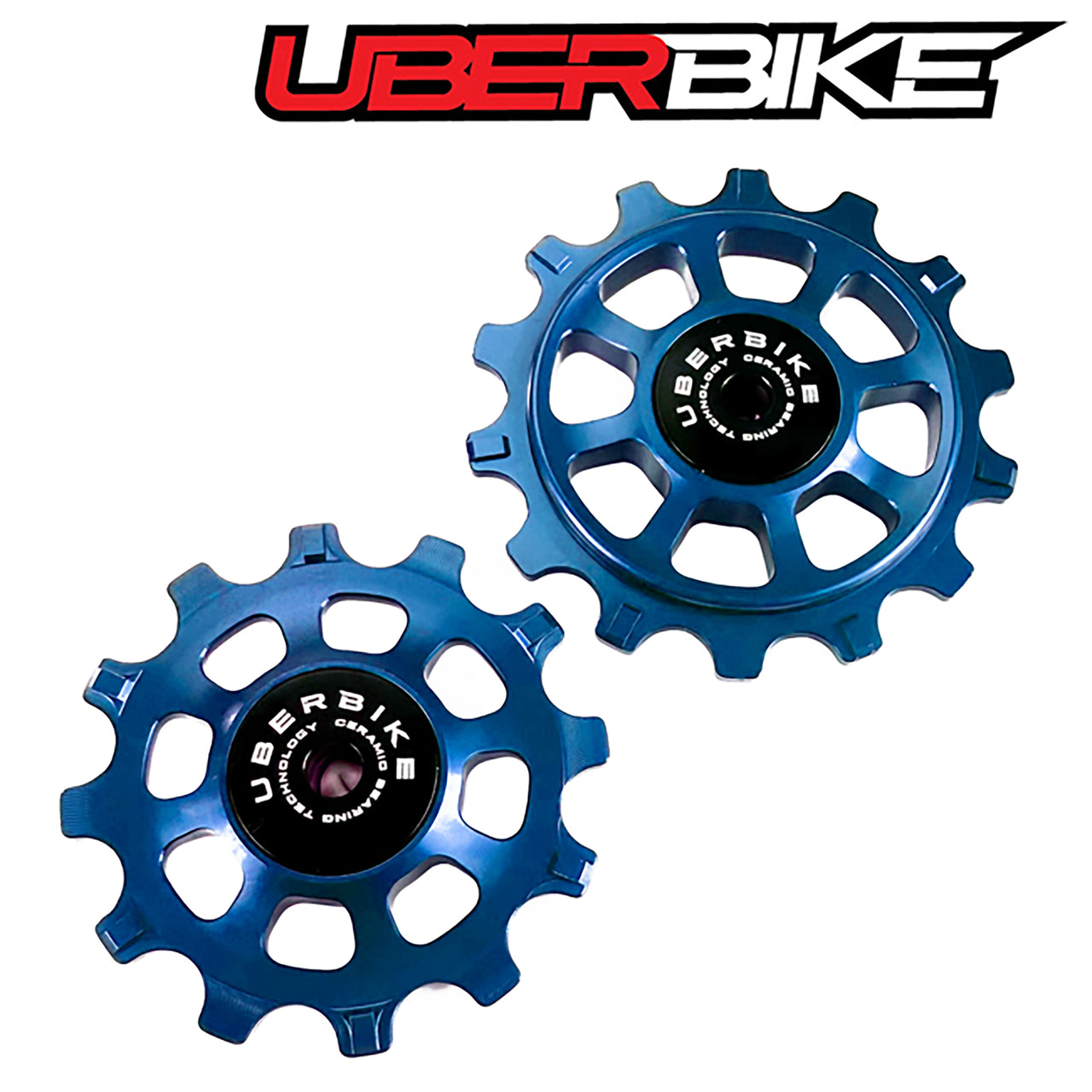 Two blue ceramic pulleys with Uberbike logo on a white background.