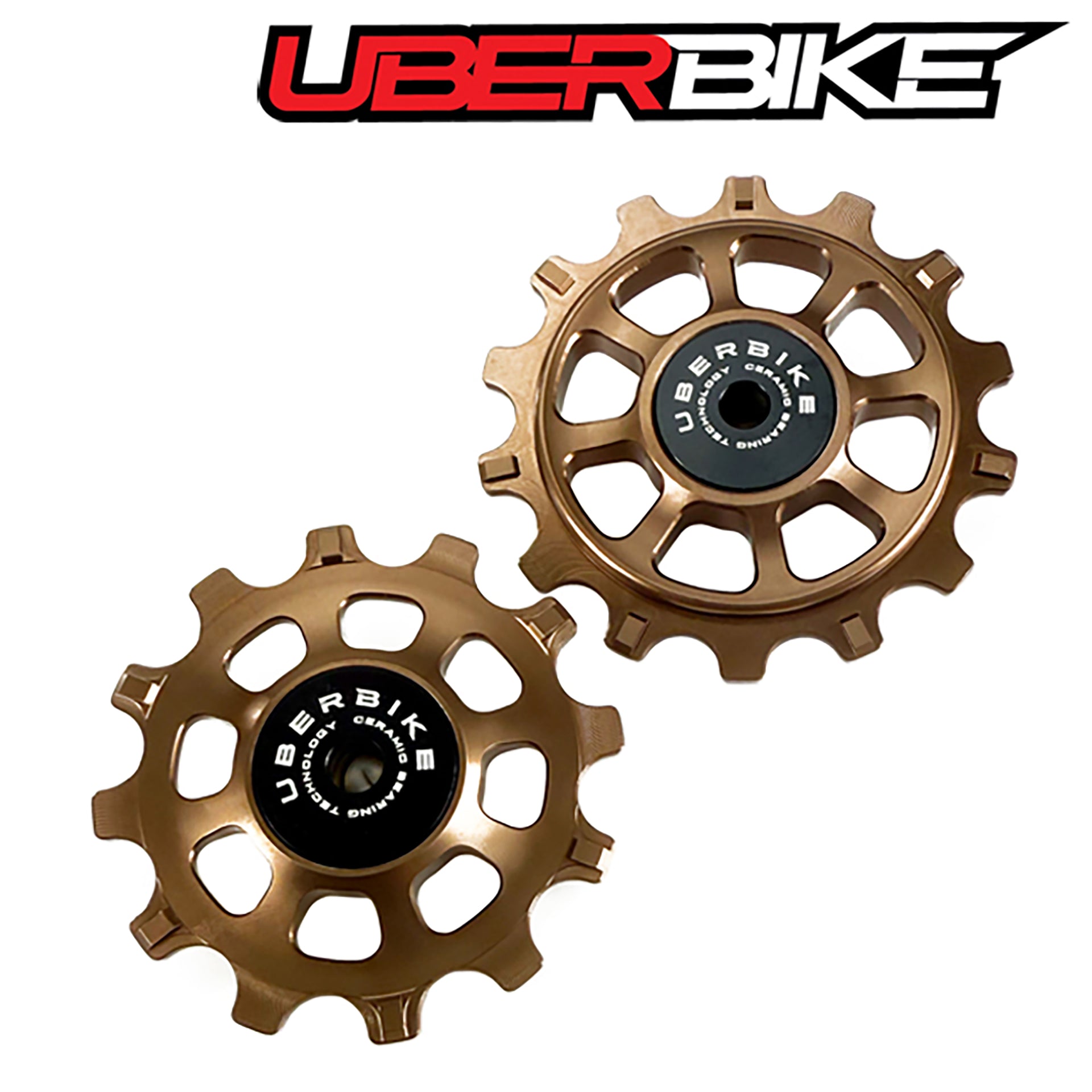 Two bronze colour Ceramic pulley wheels with 'Uberbike' branding on a white background.