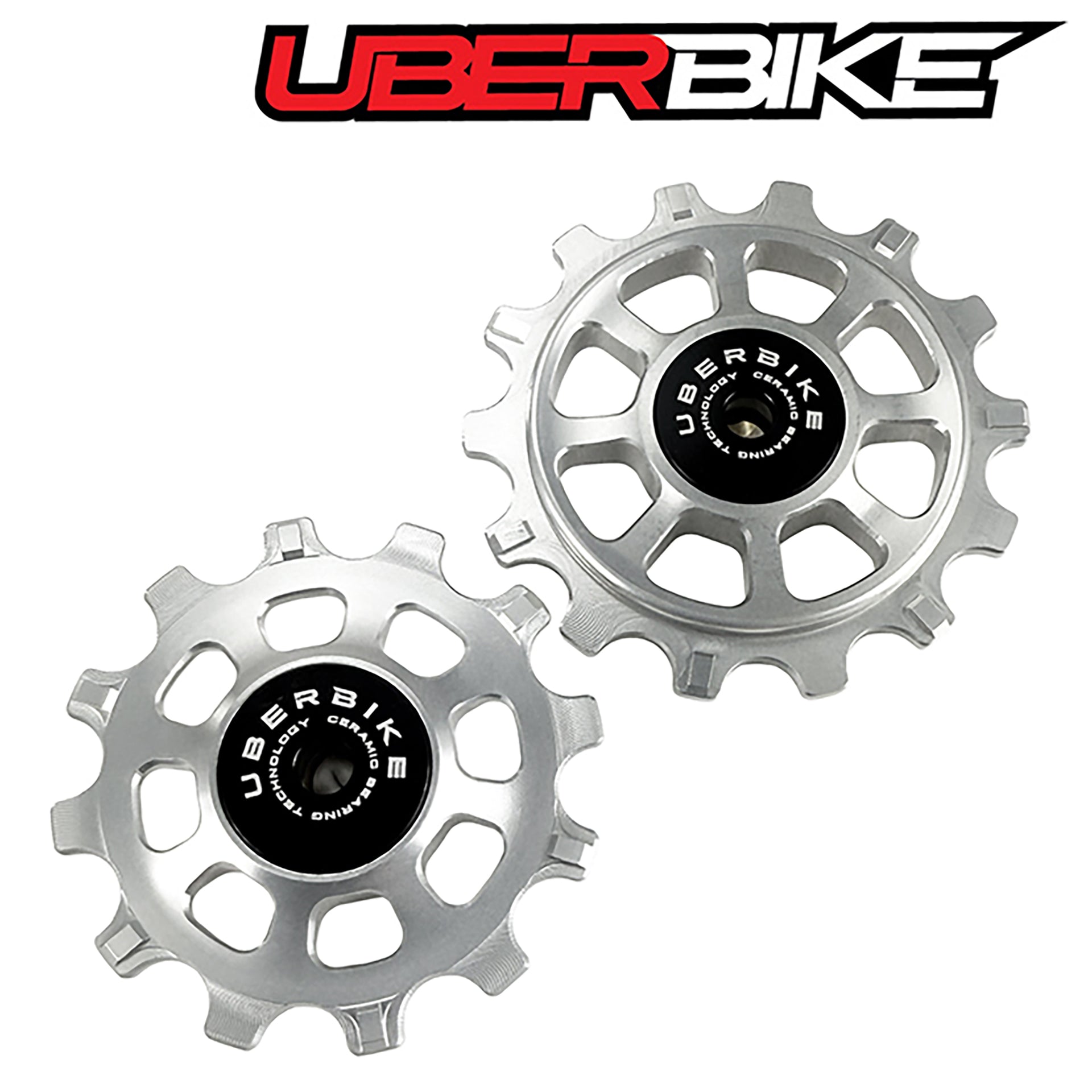 Two silver colour Ceramic pulley wheels with 'Uberbike' branding on a white background.