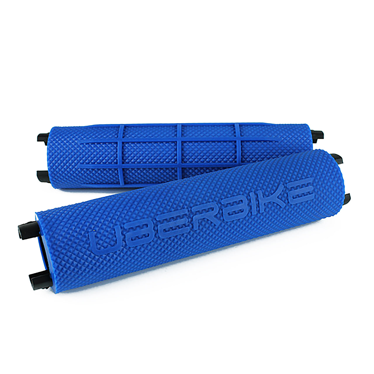 Two blue bicycle handlebar grips with 'Uberbike' branding on a white background