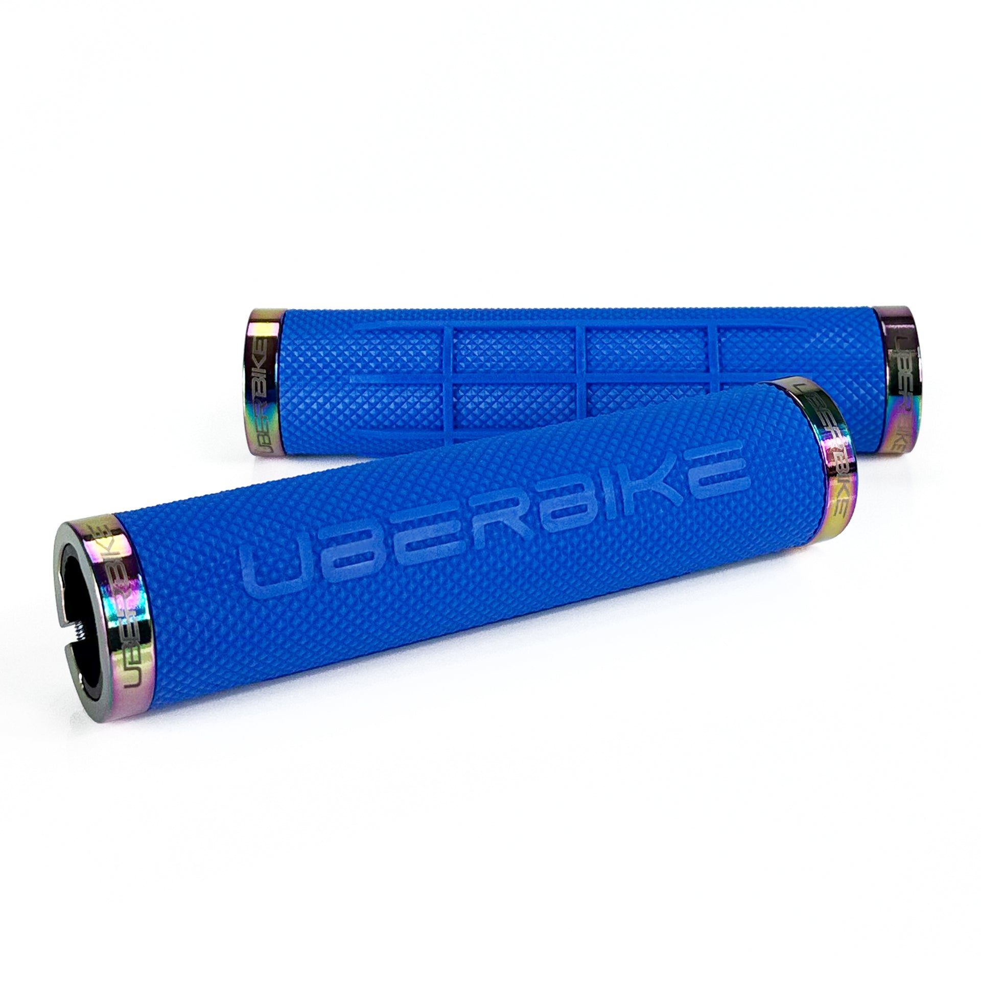 two blue fat grip mountain  bike grips and oil slick lockrings on a white background