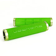 two green fat grip mountain  bike grips and green lockrings on a white background