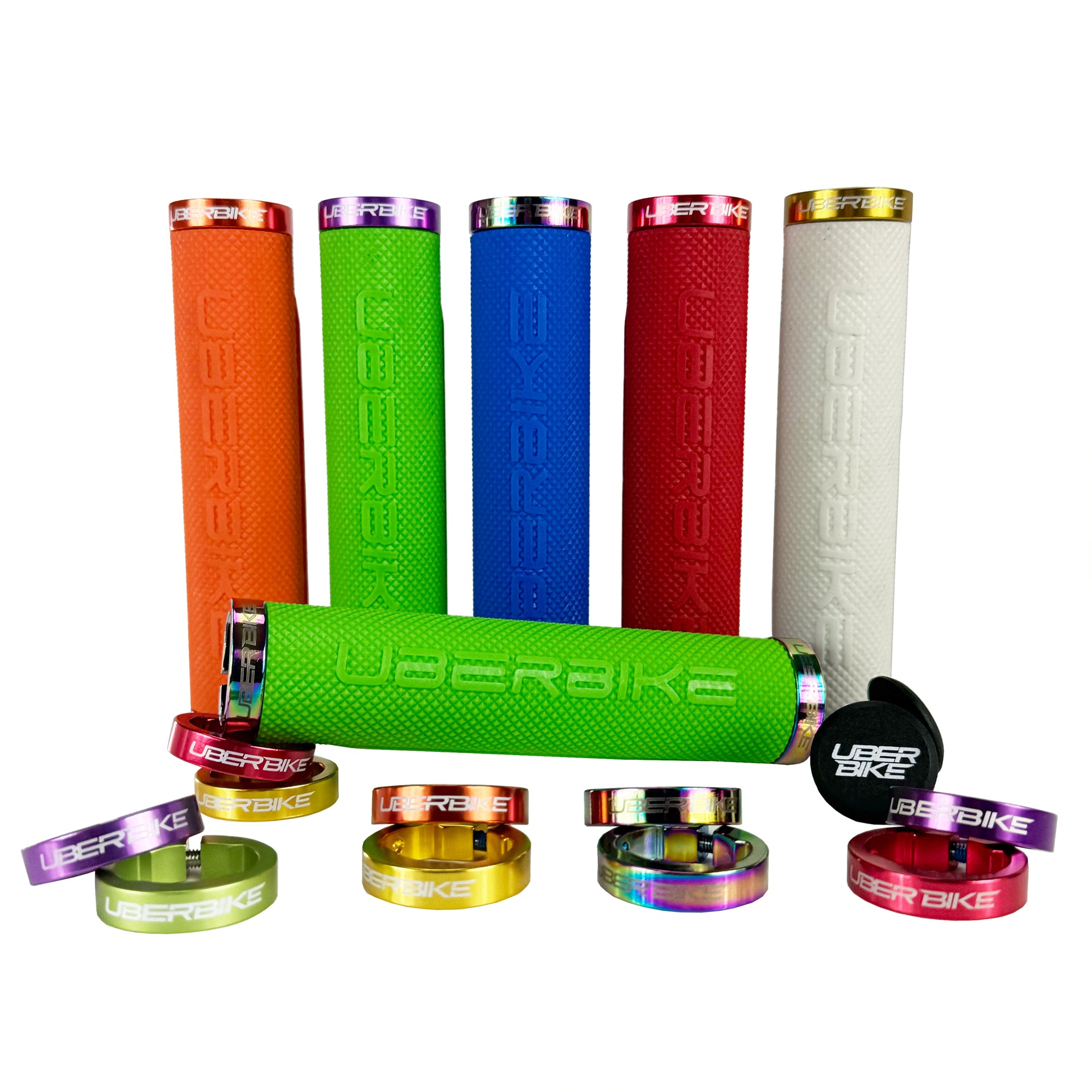 Set of colourful bike handlebar grips and lockrings on a white background