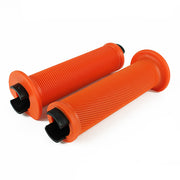 a pair of orange flange bicycle grips on a white background