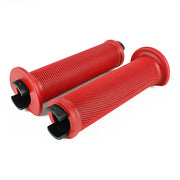 a pair of red flange bicycle grips on a white background