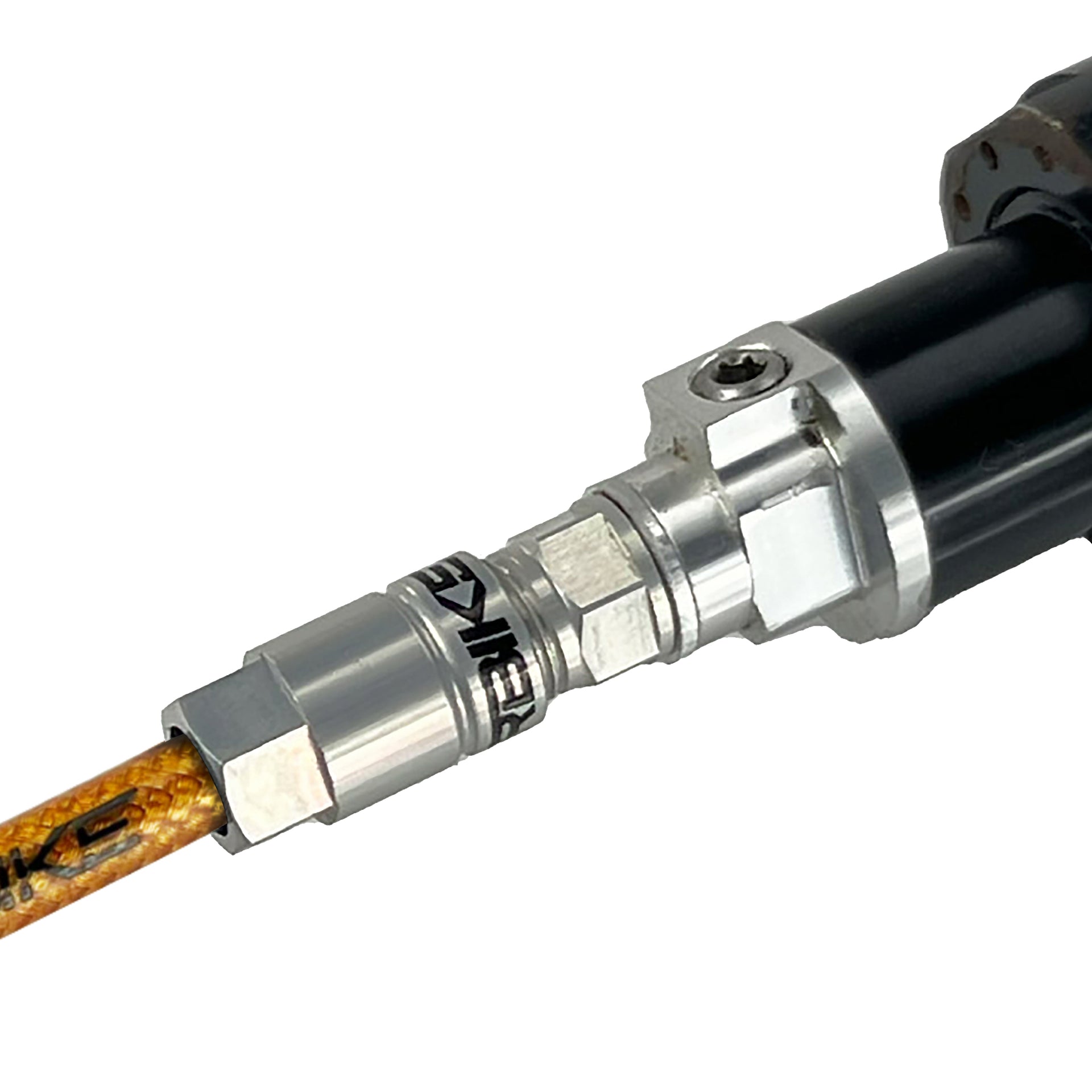 gold braid reverb hose installed in a dropper post on a white background