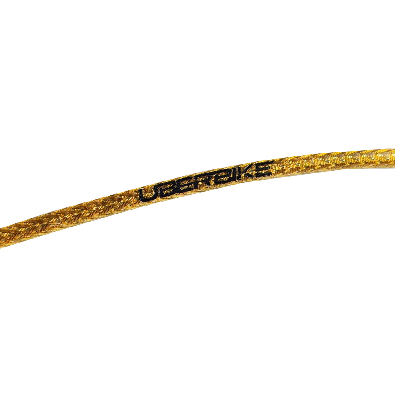 gold braid replacement gear cable with Uberbike branding on a white background 