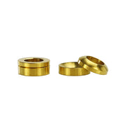 4 gold cup and cone washers on white background