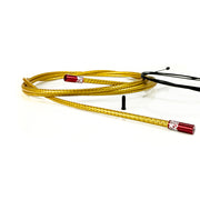 gold braid road gear cable with red sealed ferrules on a white background