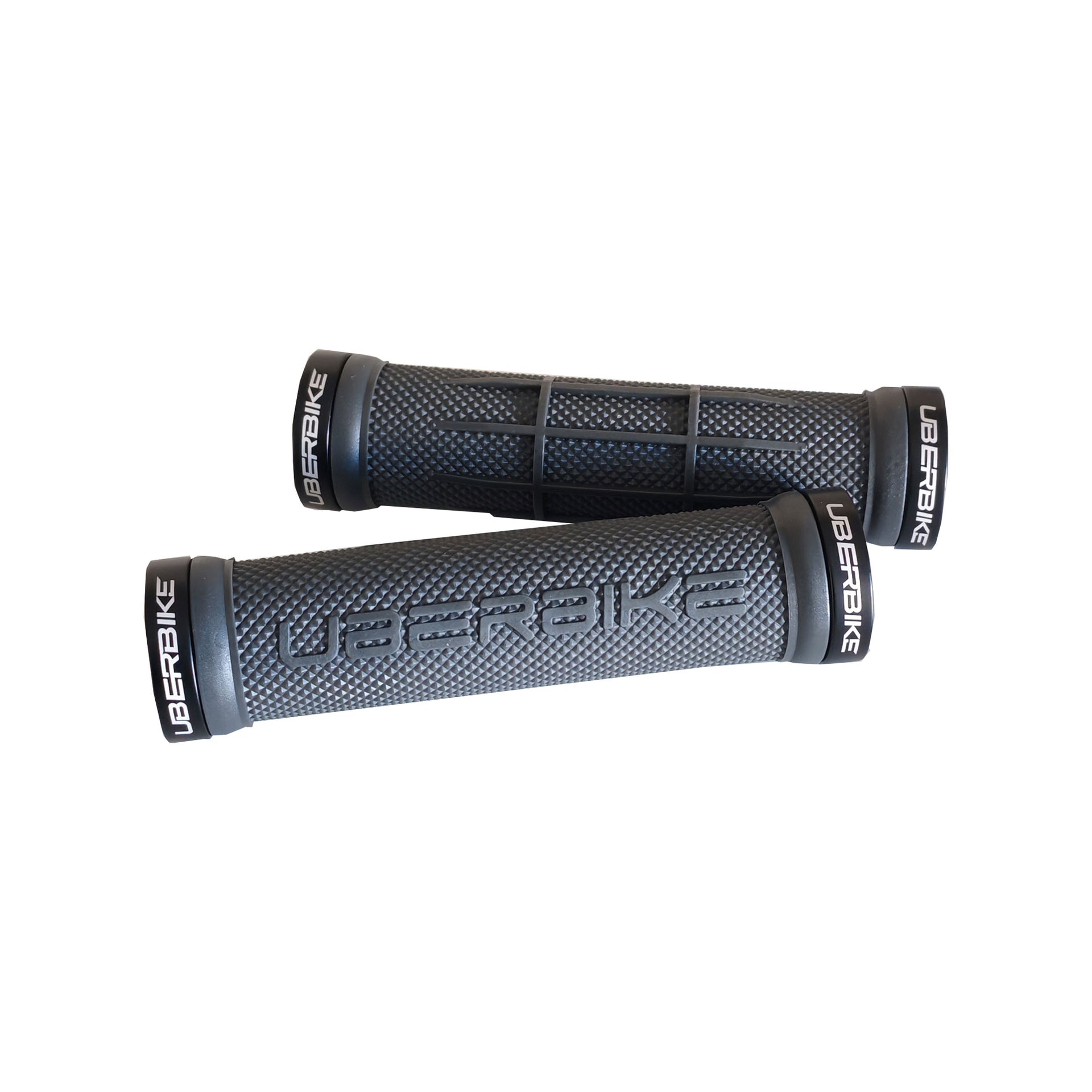 2 grey half waffle mountain bike grips with black lockrings and uberbike branding on a white background