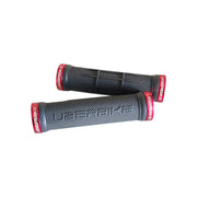 2 grey half waffle mountain bike grips with red lockrings and uberbike branding on a white background
