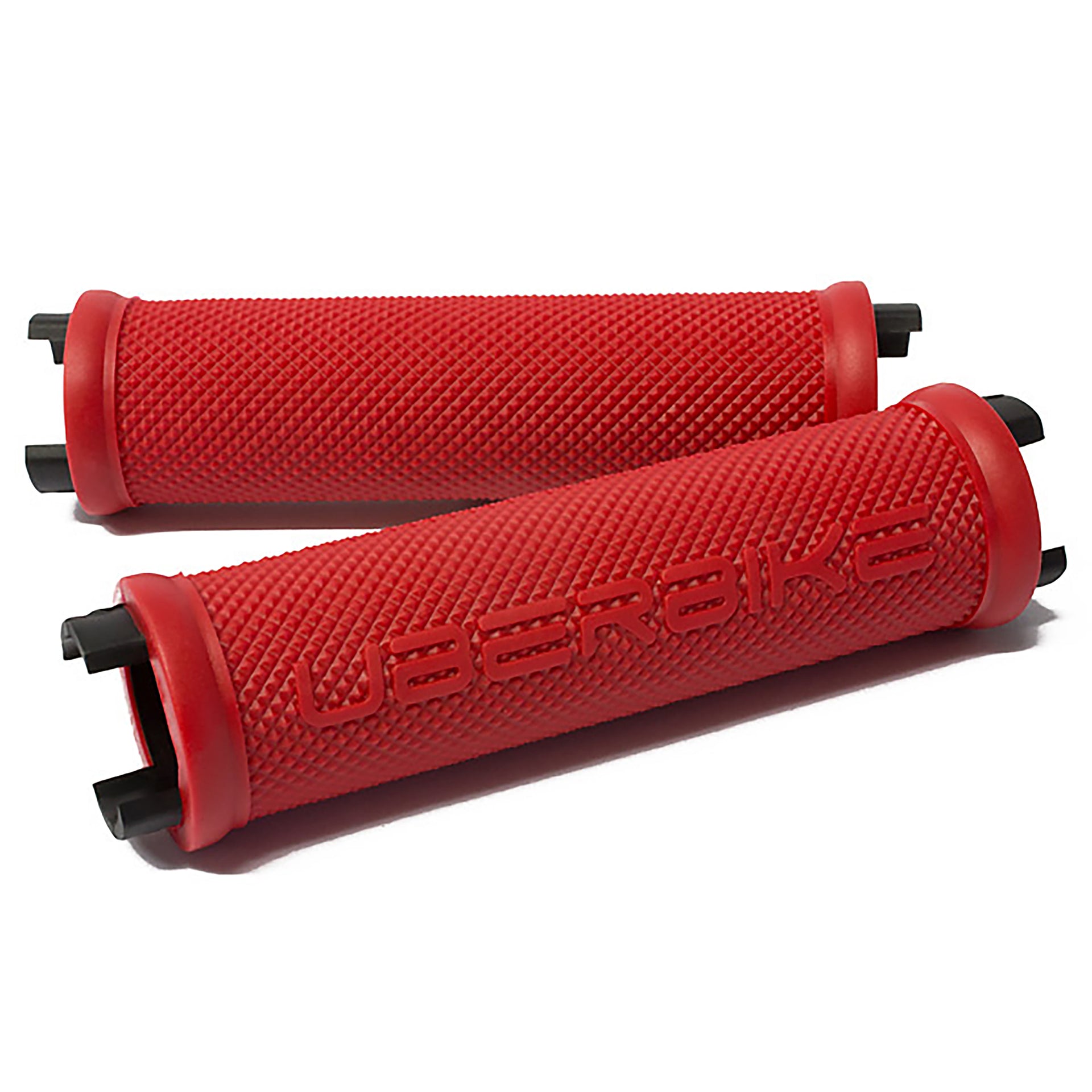 Two red skinny grip inserts on a white background