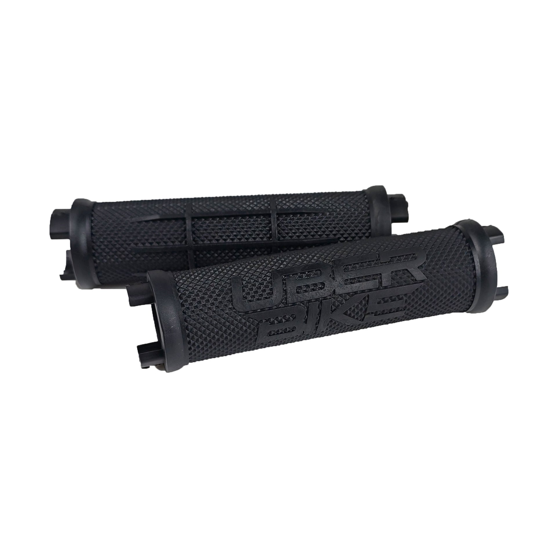 2 black half waffle grip mountain bike grips with uberbike branding on a white background