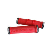 2 red half waffle mountain bike grips with black lockrings and uberbike branding on a white background