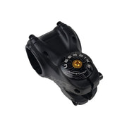 black headset top cap with a gold bolt with uberbike branding on a white background