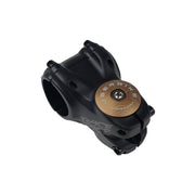 bronze headset top cap with a raw bolt with uberbike branding on a white background